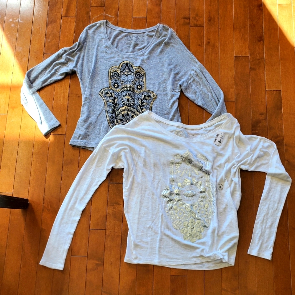 2 extra small cotton shirts .